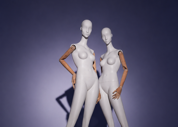 Two white mannequins against a purple background